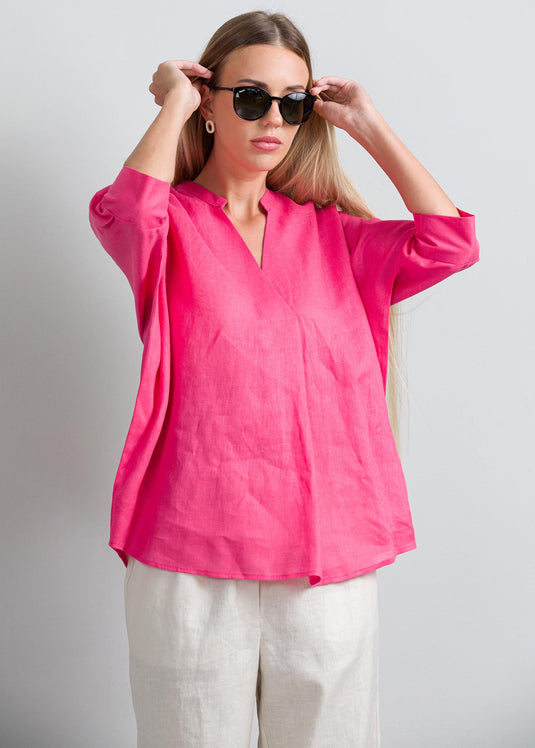 Oversized blouse with front pleat