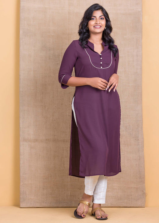 Kurtha top with contrast piping and button detail