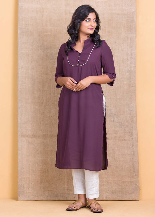 Kurtha top with contrast piping and button detail