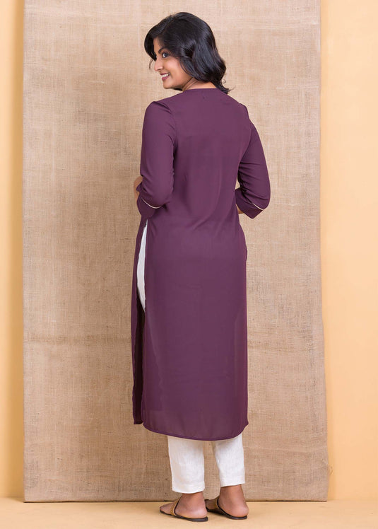 Kurtha top with contrast piping and button detail