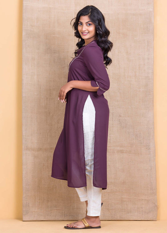 Kurtha top with contrast piping and button detail