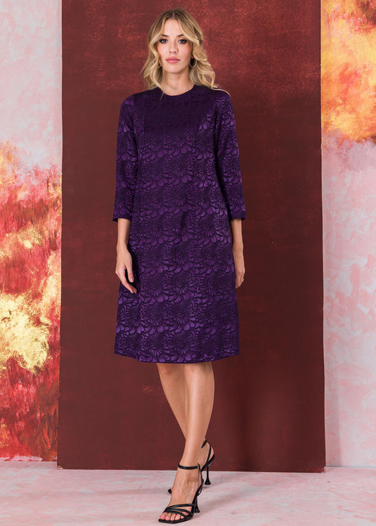 Three quarter sleeve brocade dress with round neck