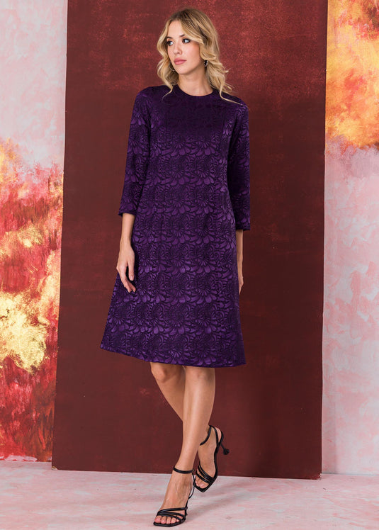 Three quarter sleeve brocade dress with round neck