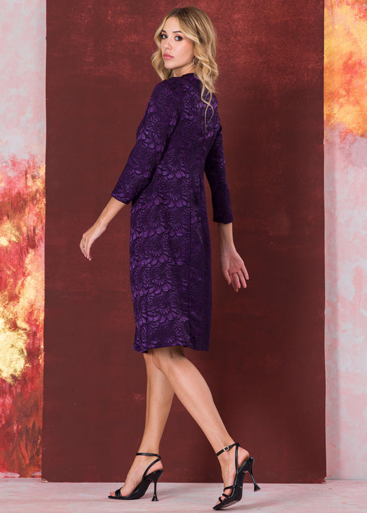 Three quarter sleeve brocade dress with round neck