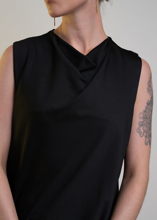 Sleeveless Round Neck Blouse With Asymmetrical Hem