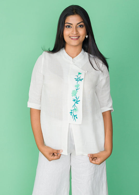 EMBROIDERED FLAP DETAIL BLOUSE